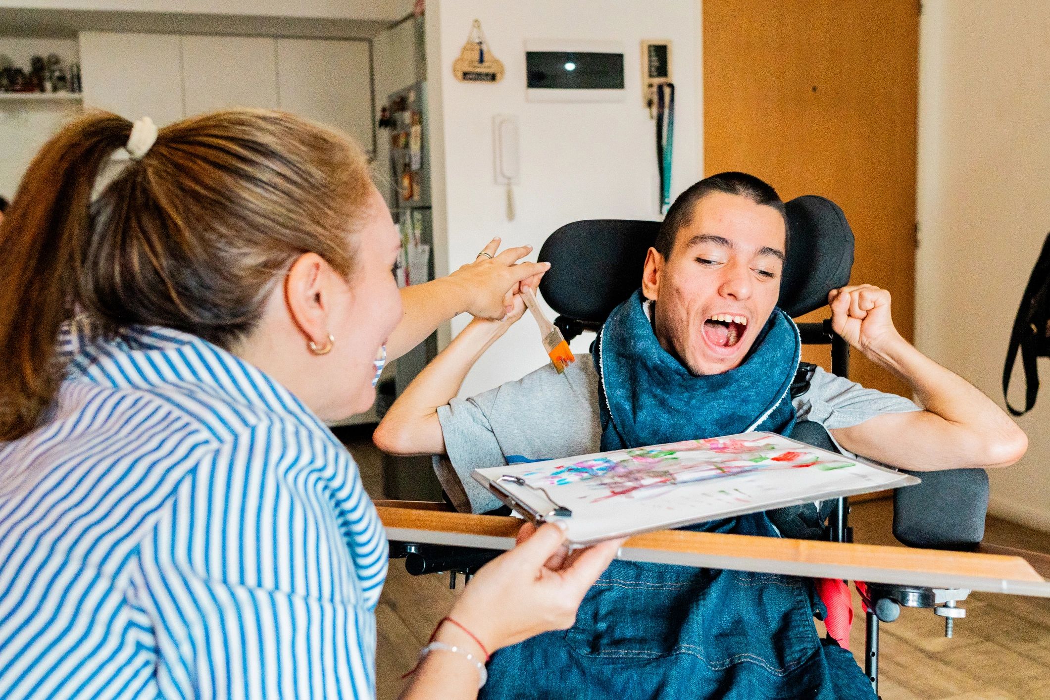 NDIS provider team helping disabled person